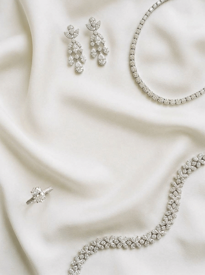 Bridal high jewelry collection on white silk